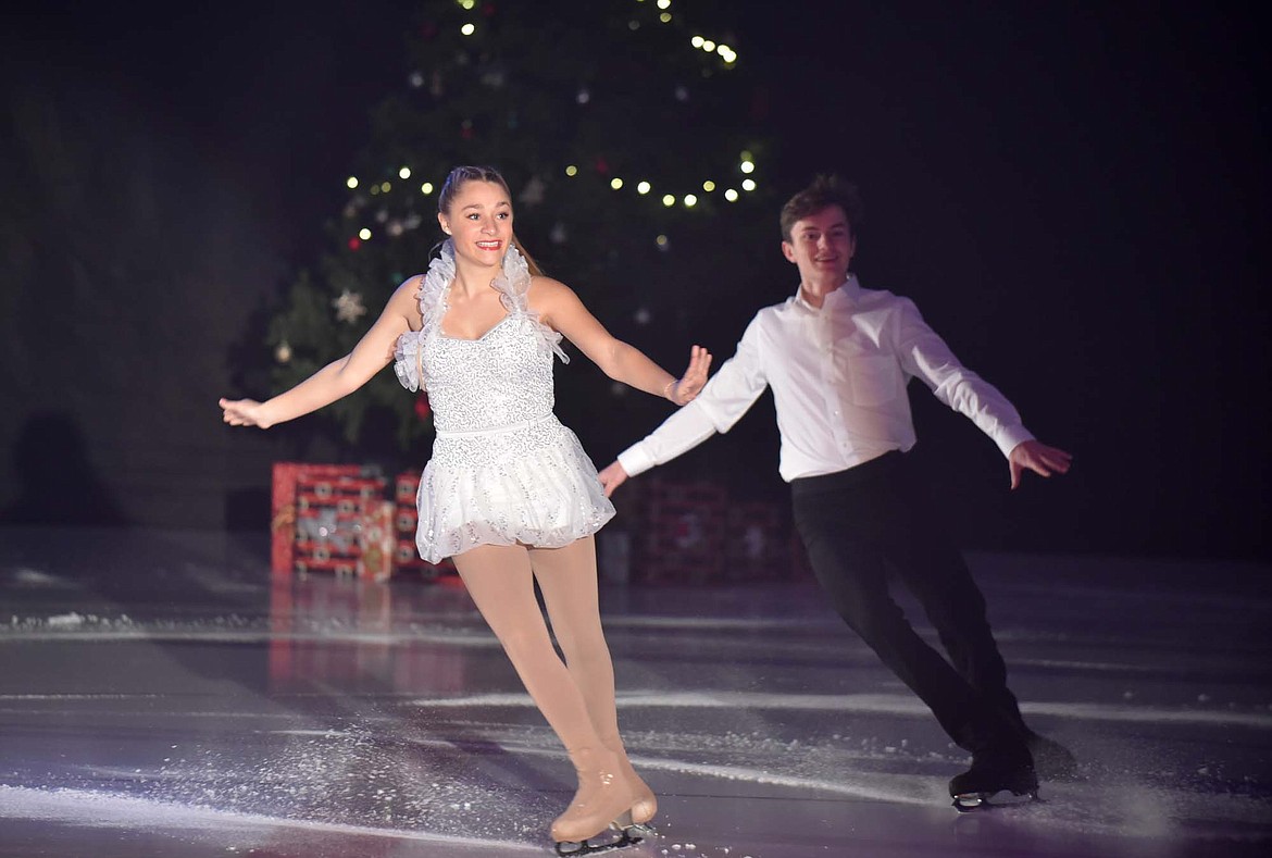 Muriel Mercer and Kamden Black&#160;skate on the ice together during the Glacier Skate Academy&#146;s &#147;Christmas on Ice&#148; show at Stumptown Ice Den. (Heidi Desch/Whitefish Pilot)