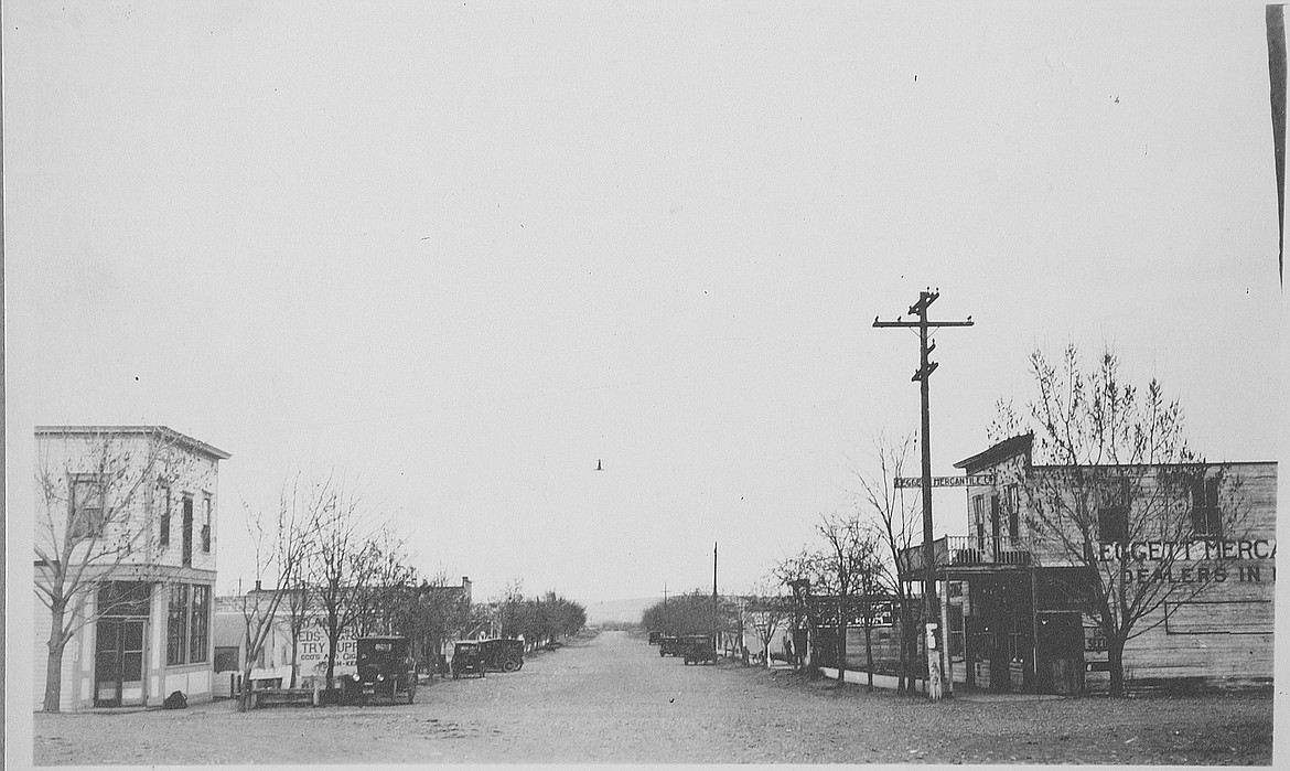 Courtesy photo/United States Department of Energy
The main street of White Bluffs as it looked in 1922. The picture is looking east towards the river. On the left is the Commercial Hotel, formerly Oasis Saloon, with the Leggett Mercantile Store, on the right. They were moved from East White Bluffs, the original site of the town on the east side of the Columbia River.