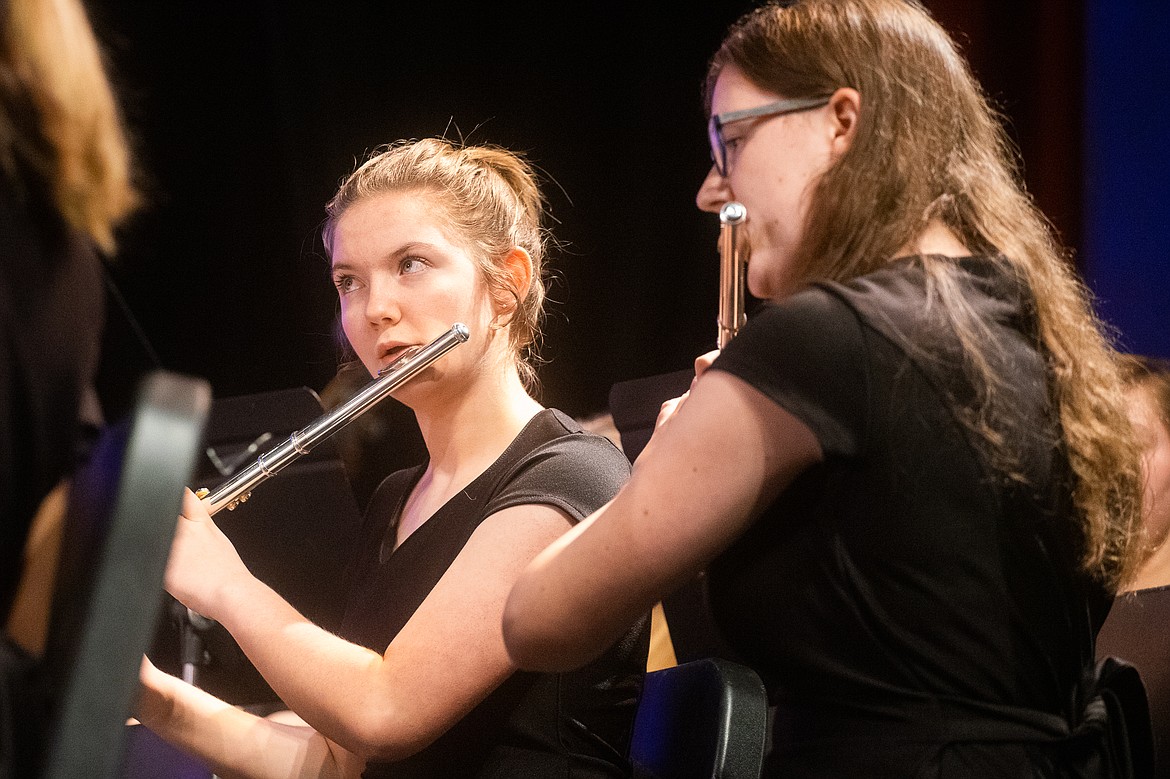 Addison Blackaby and McKynzi Adams perform on the flute during the WHS band's Winter Concert last week. (Daniel McKay/Whitefish Pilot)