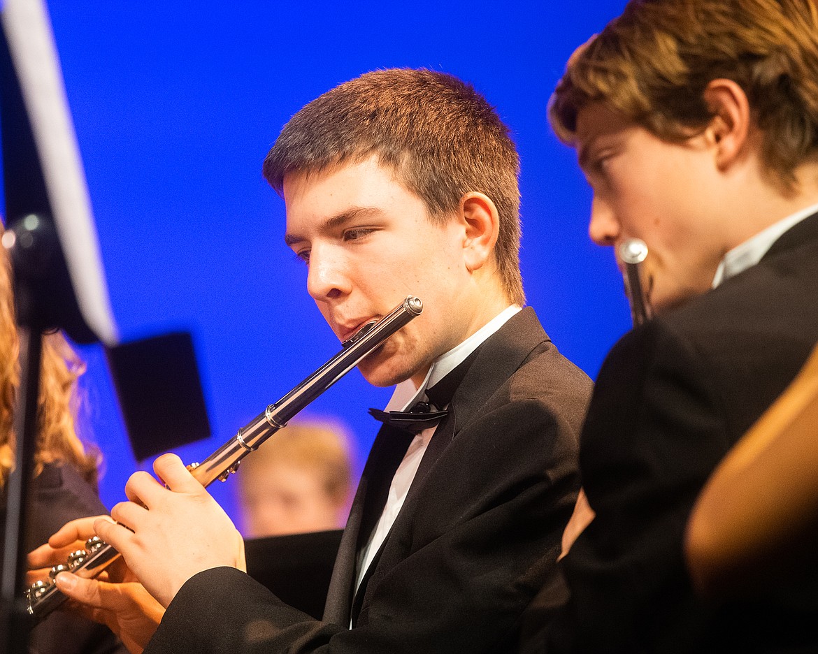 Kitar Olsen and Ethan Schott perform in the WHS band's Winter Concert last week. (Daniel McKay/Whitefish Pilot)