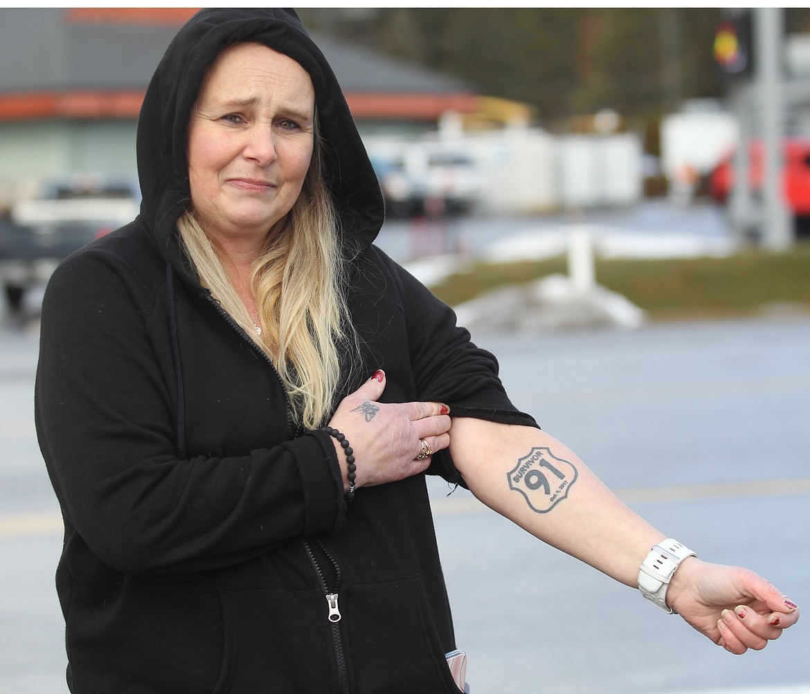 CRAIG NORTHRUP/Press
Crystal Hanson waited along the highway Wednesday morning, hoping to see her daughter, a senior at Lakeland High School. Hanson said the school&#146;s lockdown stirred unwanted emotions, as she was a survivor of the 2017 Route 91 Harvest Root music festival in Las Vegas, where a gunman killed 58 and shot 413 more.