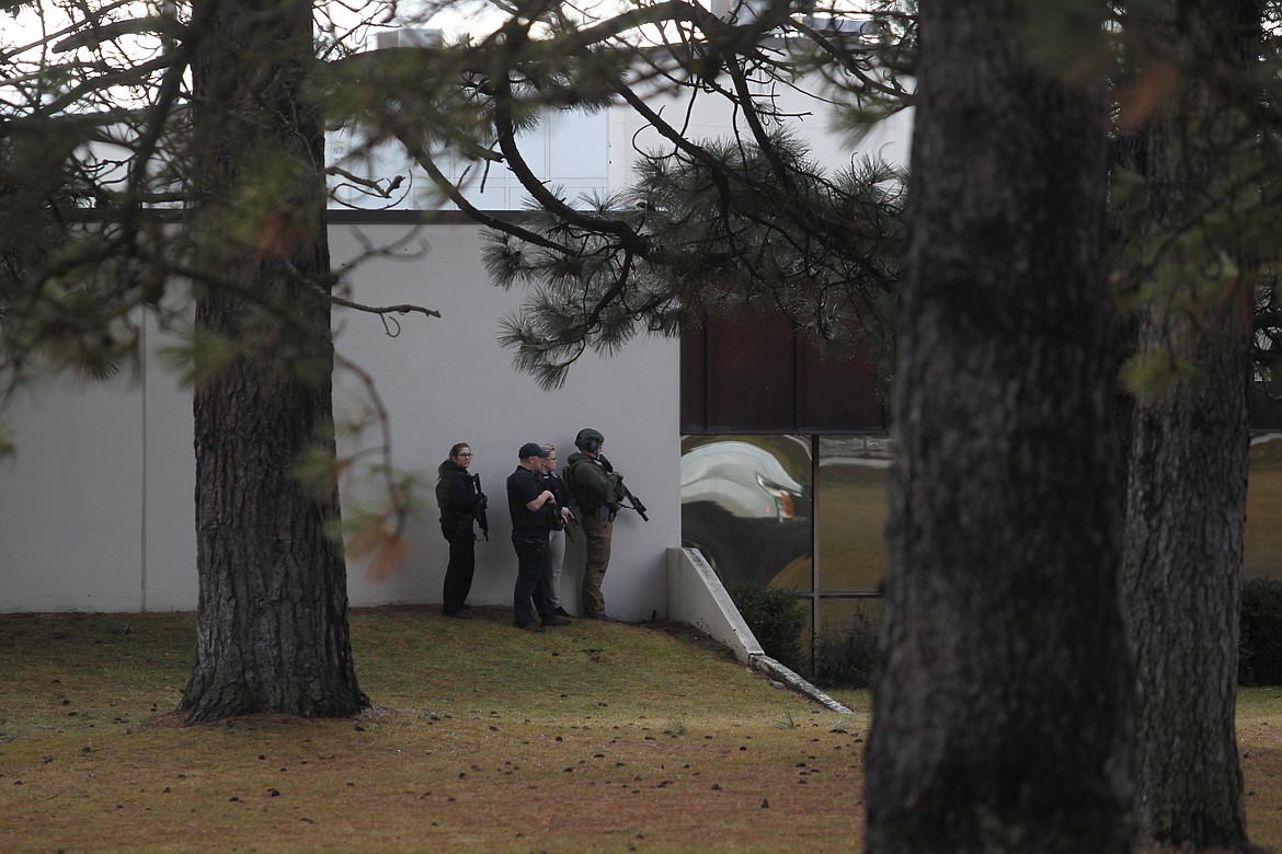 Multiple agencies &#151; including Rathdrum Police Department, the Kootenai County Sheriff's Office and Idaho State Police &#151; descended on Lakeland High School Wednesday morning after a teacher reported hearing a gunshot in the Rathdrum school. No gunman has been found, and as of 12:14 pm, the school is still on lockdown. (CRAIG NORTHRUP/Press)