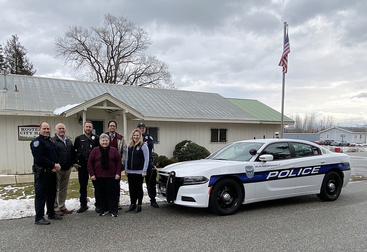 (Photo by CAROLINE LOBSINGER)
Sandpoint and Kootenai officials gather to celebrate the first day of a law enforcement partnership. Pictured, from left, are Sandpoint Police Chief Corey Coon, Lake Pend Oreille School District Superintendent Tom Albertson, Sandpoint school resource officer Spencer Smith, Kootenai Mayor Nancy Lewis, Sandpoint Mayor Shelby Rognstad, Kootenai Elementary principal Kelli Knowles and Sandpoint school resource officer Dave Giffin.