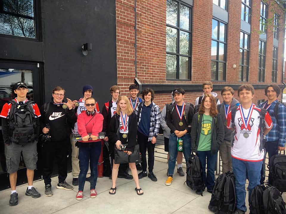 (Photo courtesy of DALTON HAWKINS) 
The Sandpoint eSports team club poses for a picture after a competition against Lakeside last year in Coeur d&#146;Alene. Pictured from left to right: Ixander Clerique, Tristan Broehl, Luke Uzabel, Sierra Cannon, Joel Hill, Mary Peele, David Kekeisen, Josiah Hill, Malakai Freeman (hidden), Antonio Briatta, Alexander Leverich, Onyx Holzapfel, Gabriel Curto, Travis Debbs and Connor Moreno. Not pictured: Konner Pierce.