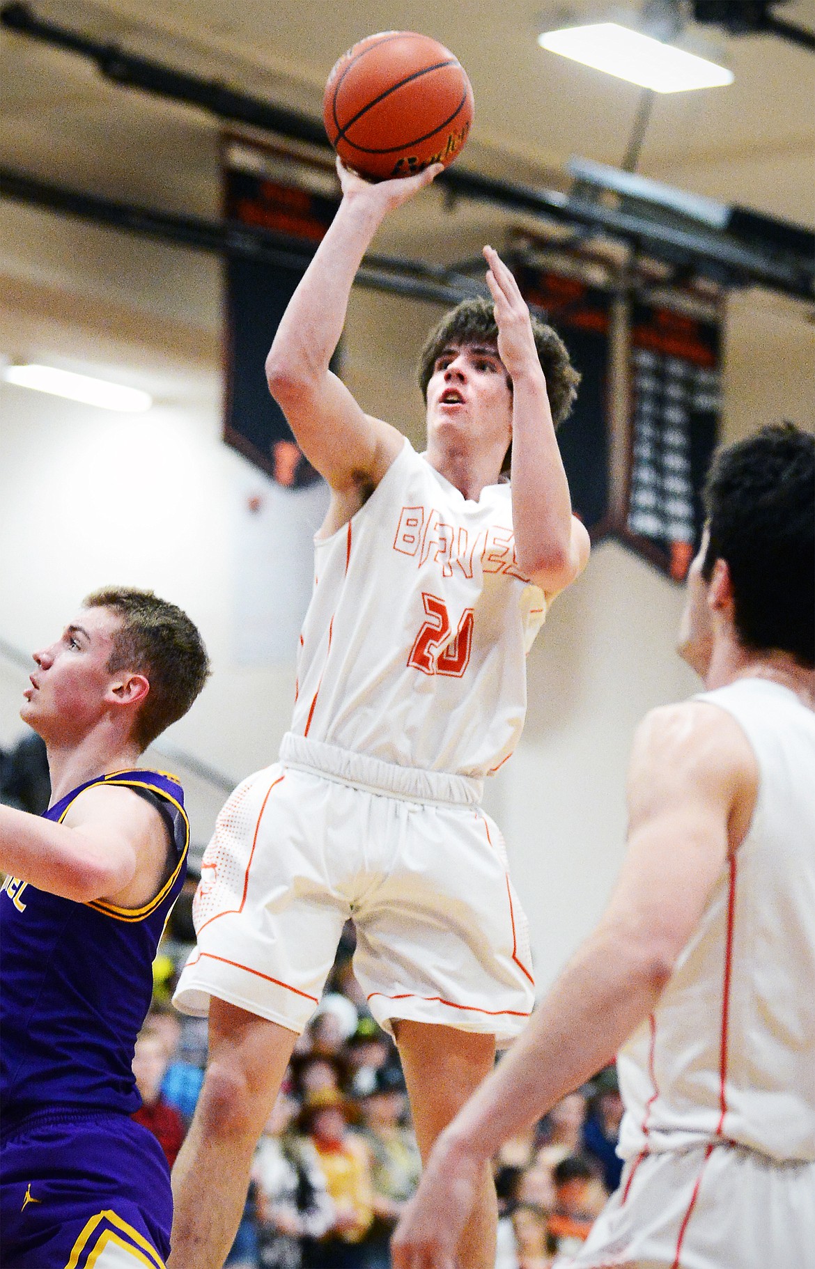 Flathead's Cooper Smith (20) shoots a jumper in the lane against Missoula Sentinel at Flathead High School on Thursday. (Casey Kreider/Daily Inter Lake)