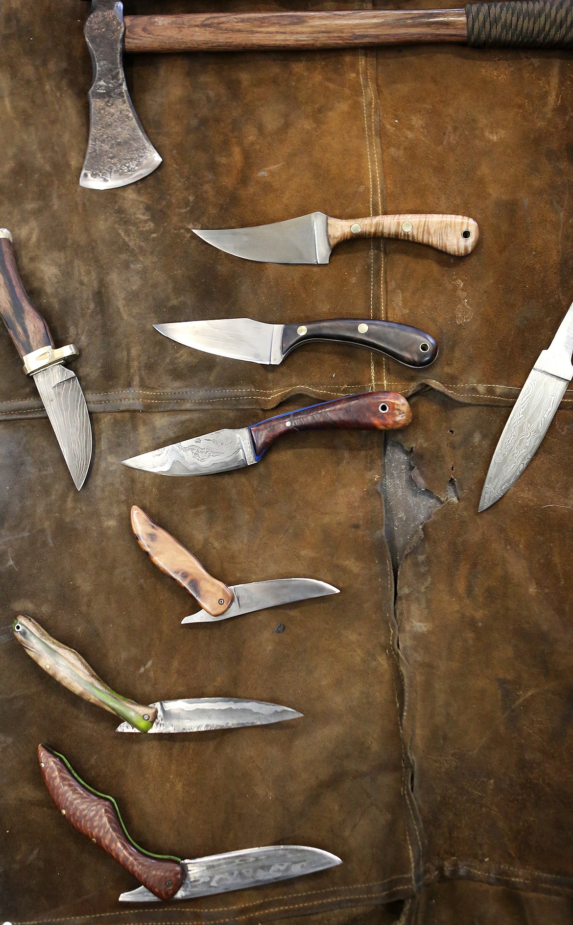 This collection of knives was handcrafted by Scott Sweder. (Mackenzie Reiss/Daily Inter Lake)