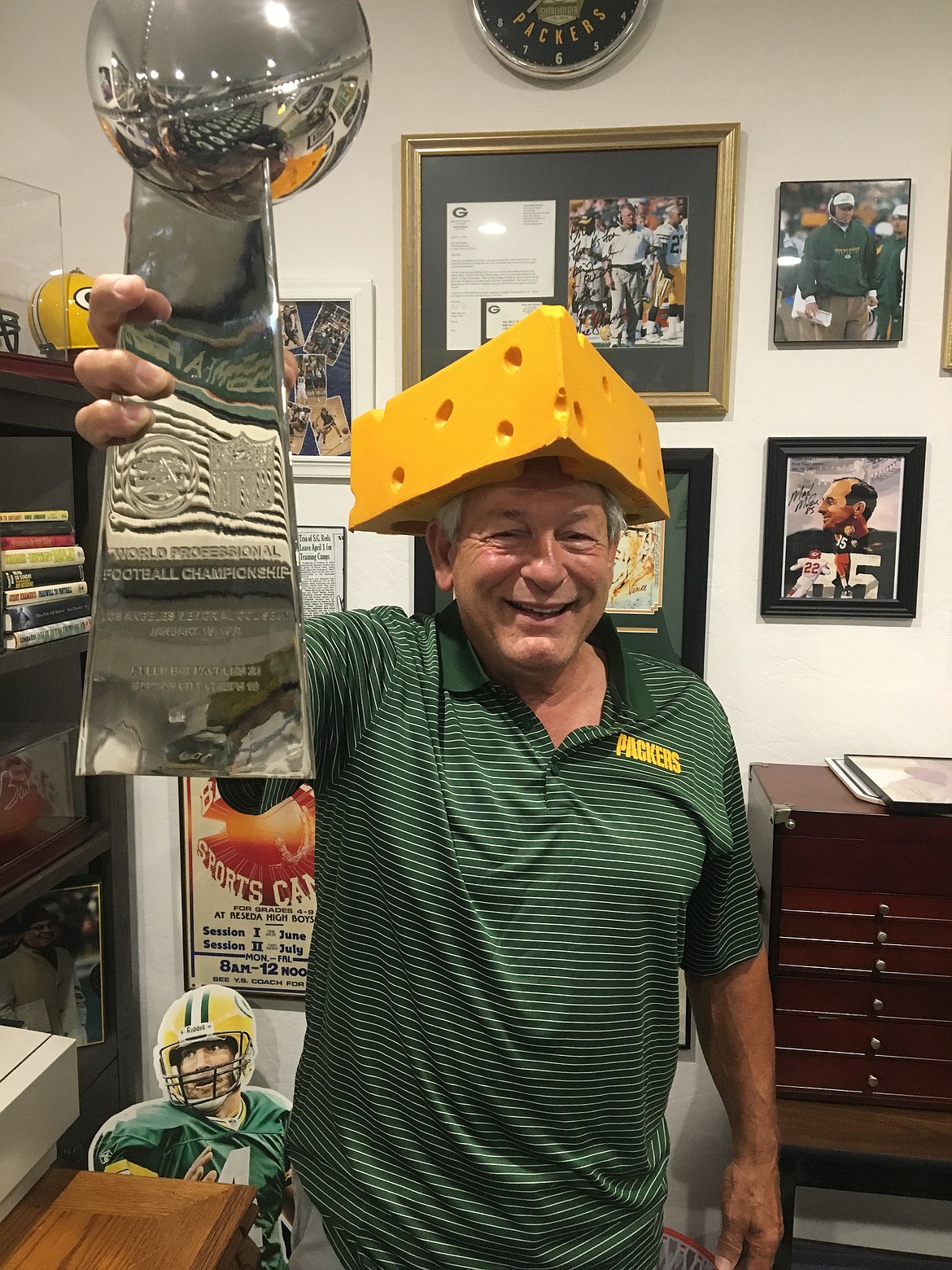 Lifelong Green Bay Packer fan Bill Hughes shows off a man cave full of Packer memorabilia, including a replica Lombardi trophy. The Coeur d&#146;Alene resident has started a January online vote campaign after his nomination Wednesday for possible induction into the Green Bay Packer Fan Hall of Fame. 

Courtesy of Bill Hughes