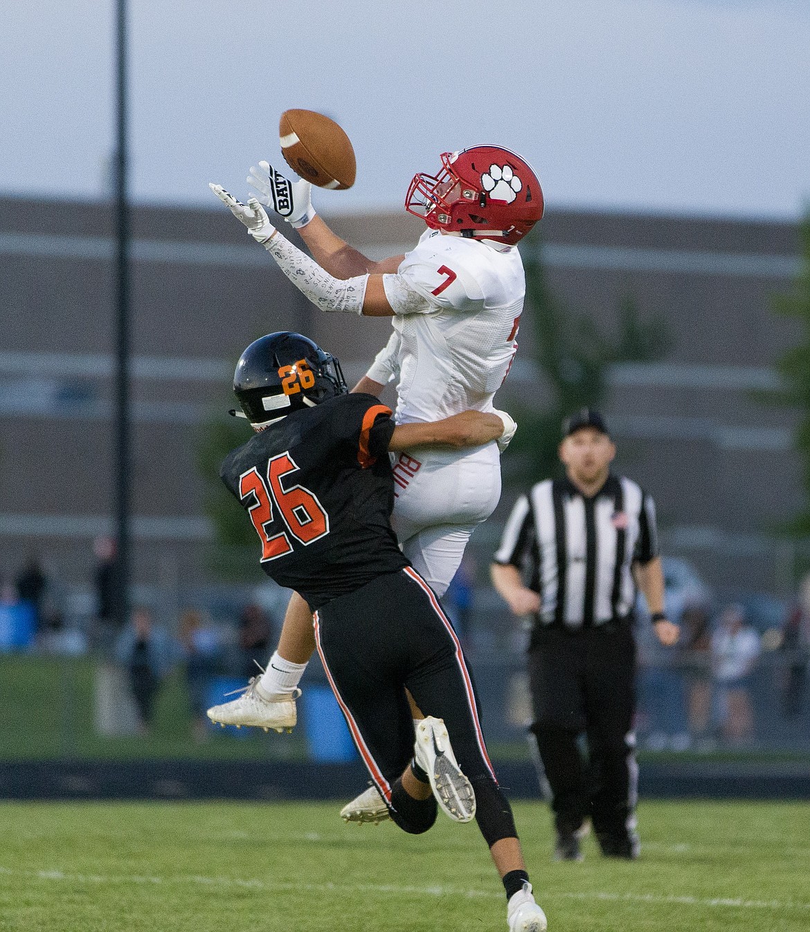 (Photo courtesy of JASON DUCHOW PHOTOGRAPHY)
Sandpoint senior Christian Niemela hauls in a 31-yard pass from Jaxon Pettit during the first half of Sandpoint&#146;s season opener at Post Falls on Aug. 30.