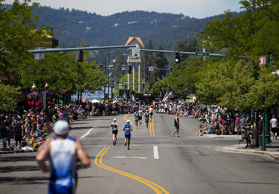 Photos by LOREN BENOIT/BJNI File
Athletes near the Ironman 70.3 Coeur d&#146;Alene finish line on Sherman Avenue in downtown Coeur d&#146;Alene in 2017.