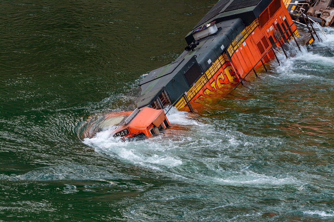 COURTESY PHOTO 
The lead locomotive of a BNSF Railway train is buffeted by the Kootenai River.