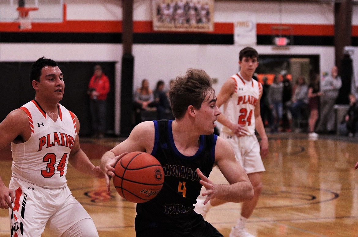 RYAN SCHRAEDER (4) scores for Thompson Falls. (John Dowd/Clark Fork Valley Press)