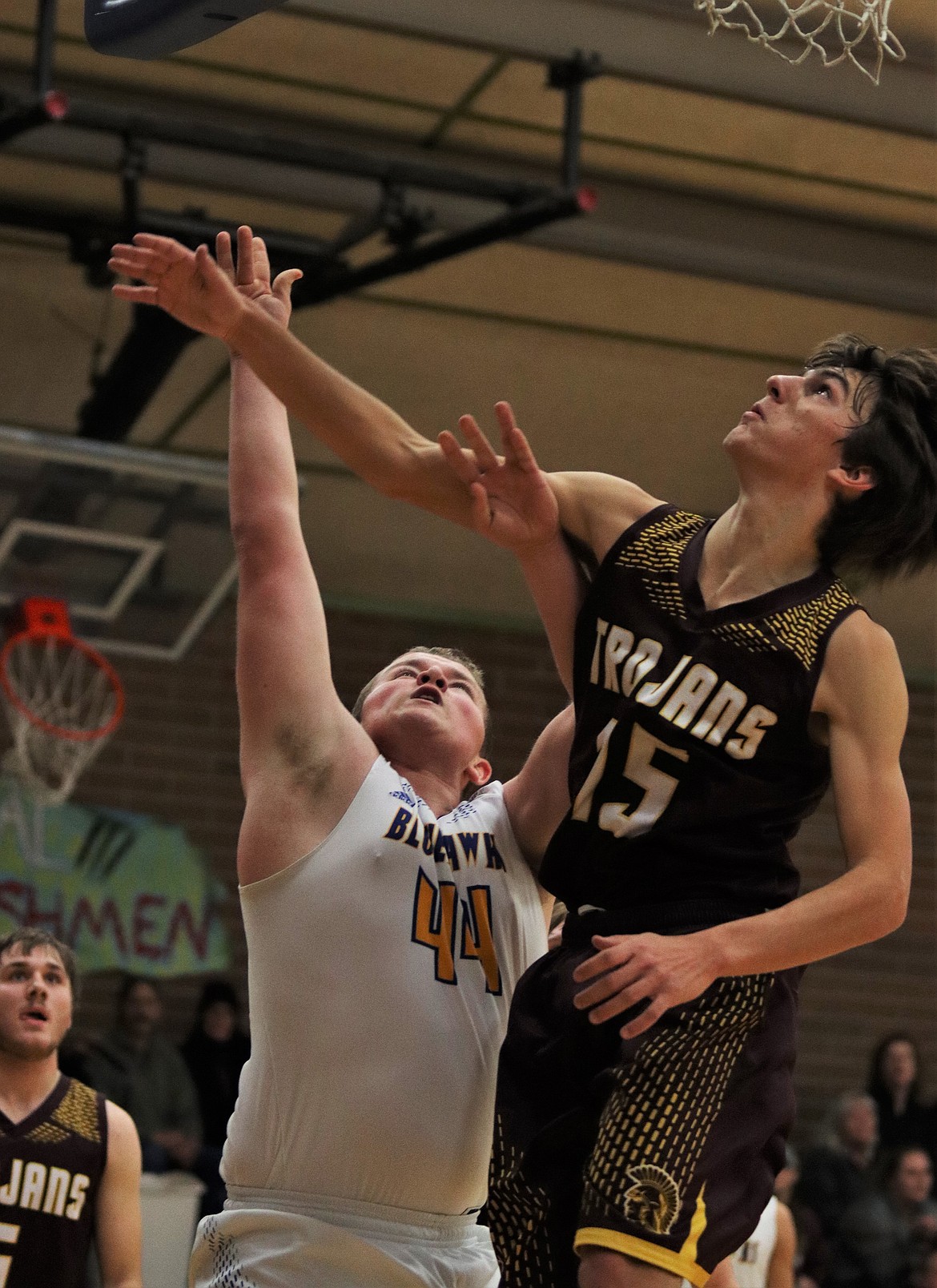 CODY BURK (44) goes up for a layup against Troy Saturday night. (John Dowd/Clark Fork Valley Press)