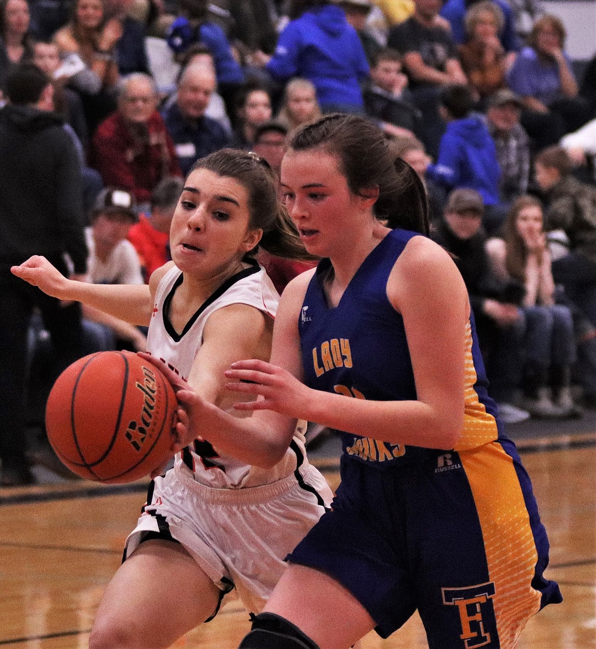 CARLIE WGONER, in the white jersey, steals the ball from Thomspon Falls&#146; Ellie Baxter. (John Dowd/Clark Fork Valley Press)