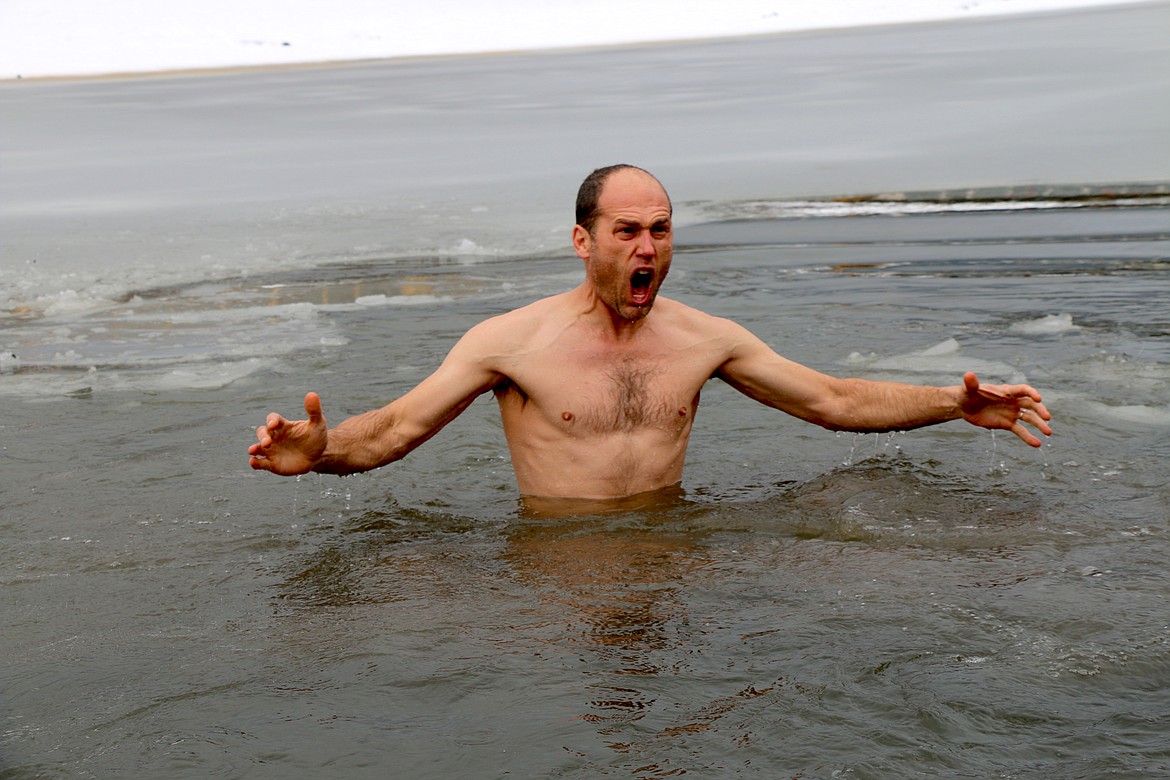 (Photo by CAROLINE LOBSINGER)
A Polar Bear Plunge participant reacts to the cold of a freezing Lake Pend Oreille during Wednesday&#146;s event.