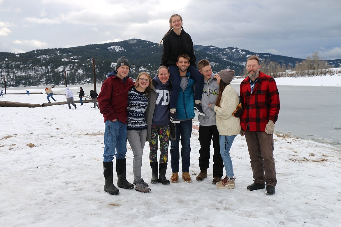 (Photo by CAROLINE LOBSINGER)A group poses for a photo at the end of Wednesday&#146;s Polar Bear Plunge.