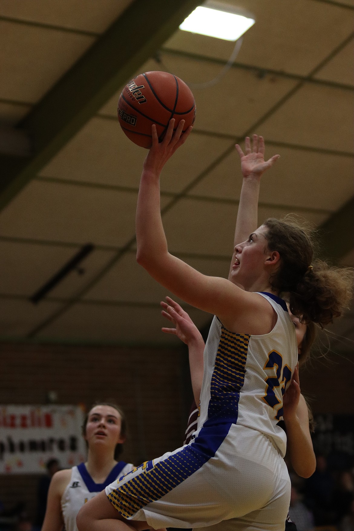 JODY DETLAFF scores for Thompson Falls last Saturday night against Troy. (John Dowd/Clark Fork Valley Press)