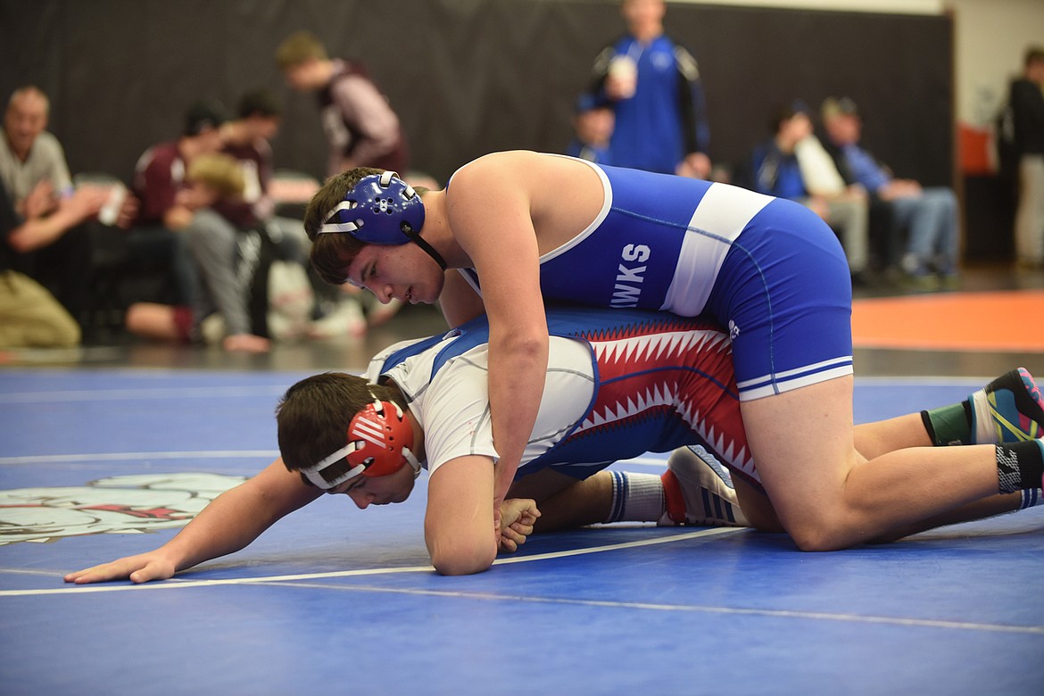 Thompson Falls Bluehawk wrestler Dakota Irvine controls Clark Fork&#146;s Chanden Vulles during their 205-pound meet Saturday at the Western Duals in Ronan. Irvine won a 10-1 major decision. (Scott Shindledecker/Clark Fork Valley Press)