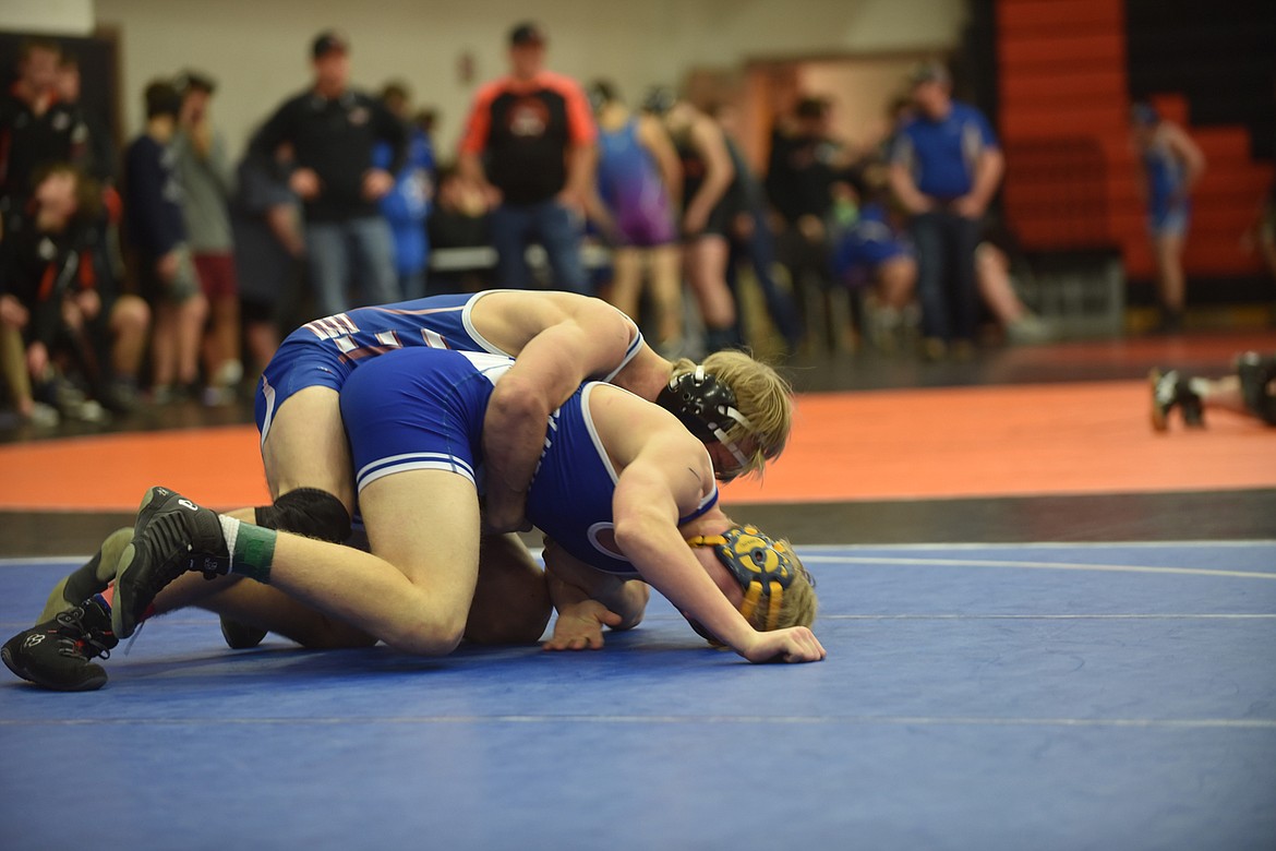 Clark Fork Mountain Cats 152-pounder Hunter Haskins, top, controls Thompson Falls wrestler Lucas Andersen during their match Saturday at the Western Duals in Ronan. Haskins won by fall in 1:40. (Scott Shindledecker/Mineral Independent)