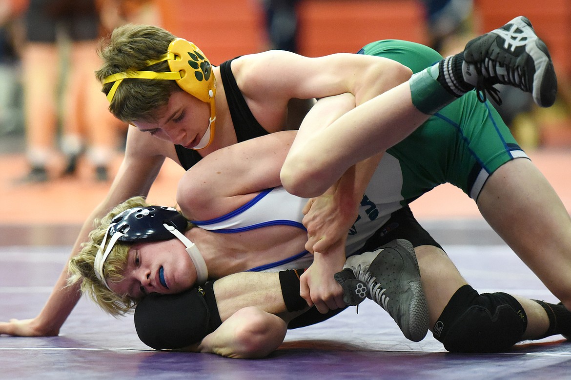 Whitefish&#146;s Kaden Brown wrestles Glacier JV&#146;s Drew Kernan at 113 lbs. at the Western Montana Duals at Ronan High School on Saturday. (Casey Kreider/Daily Inter Lake)