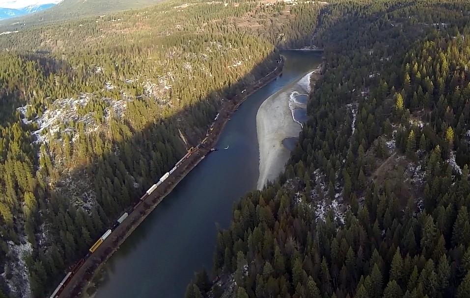 (Photo courtesy RICH LITTLE)A BNSF train derailed Wednesday night due to a rockslide, knocking six cars including the engines off the track and sending one of the locomotive engines into the Kootenai River.