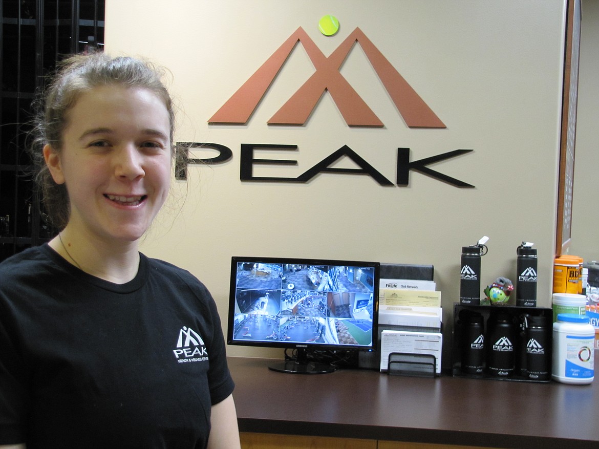 Venna Huffaker, behind the desk at Peak Fitness in Hayden, will work New Year&#146;s Day.