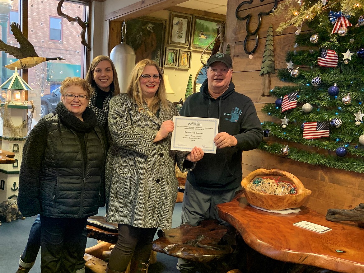 Greater Sandpoint Chamber officials present the Social Media Award to Burl Wood Dreams representatives.

(Photo 
courtesy GREATER SANDPOINT CHAMBER OF COMMERCE)