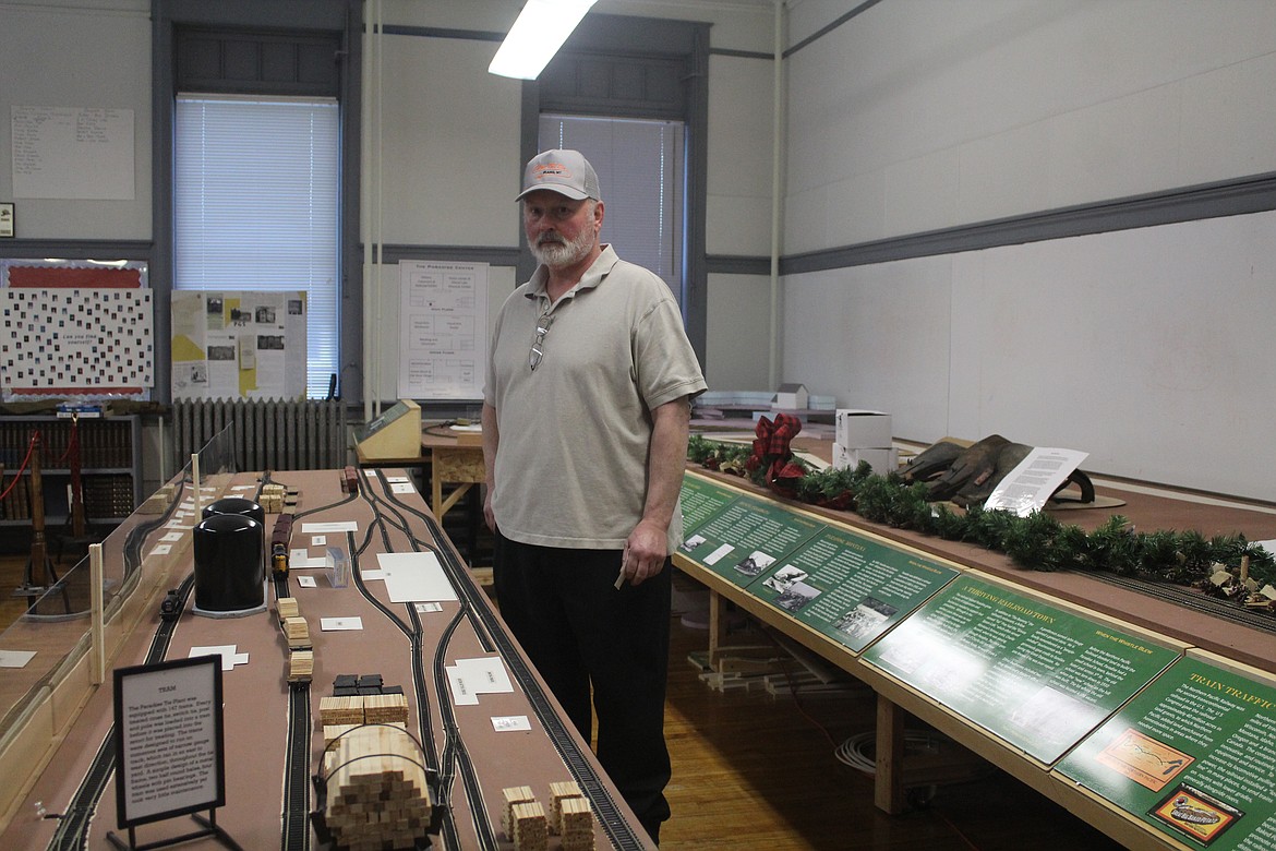 DAVE COLYER in the &#147;train room&#148; of the Paradise Center, during their open house last Saturday. (John Dowd/Clark Fork Valley Press)