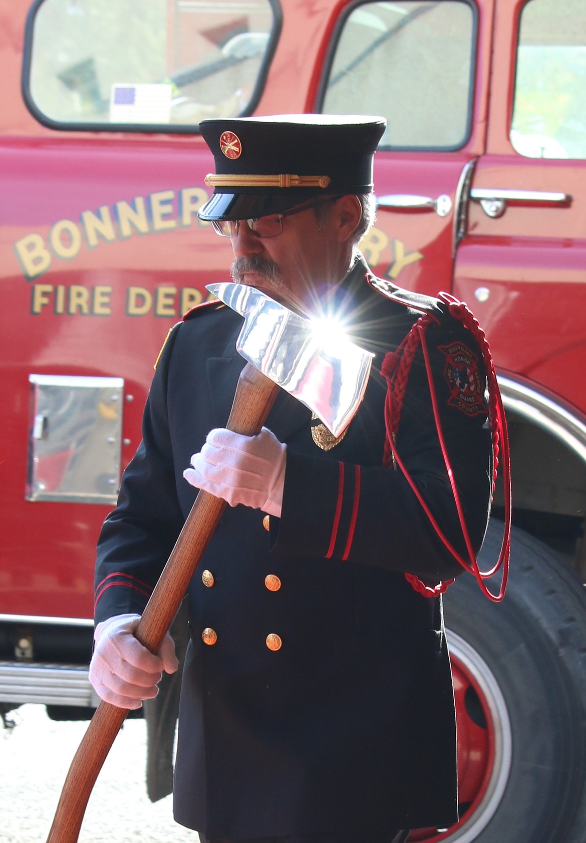 Photo by MANDI BATEMAN
Ken Baker, part of the Boundary County Fire Chiefs Association Honor Guard, during the Fallen Firefighter Memorial on Oct. 6.