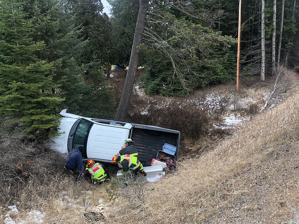 Courtesy photo
North Bench firefighters help to stabilize a truck that went off the road last week.