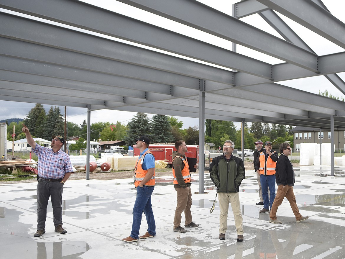 School staff and Martel Construction workers admire the kindergarten wing of the new Muldown Elementary during a school board tour of the school. (Daniel McKay/Whitefish Pilot)