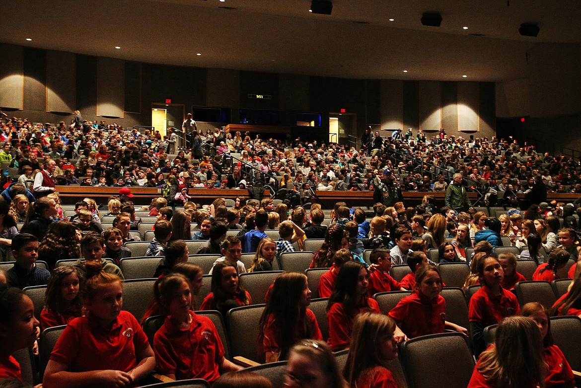 LOREN BENOIT/Press
Hundreds of Coeur d&#146;Alene School District elementary school students listen to motivational speaker Stu Cabe speak about kindness during the 35th Annual Human Rights Celebration assembly at Schuler Auditorium Thursday at NIC.