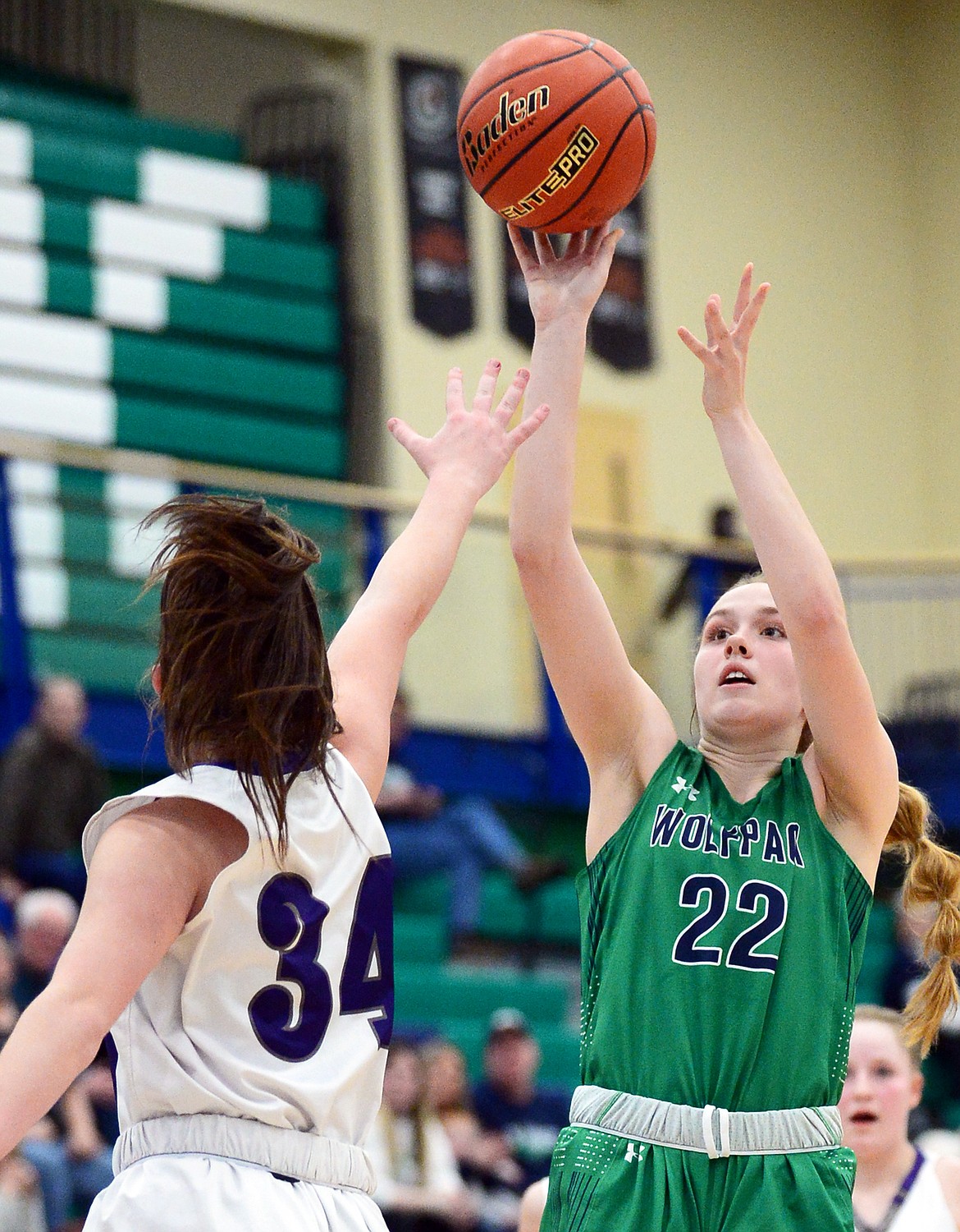 Glacier's Ellie Keller (22) shoots over Butte's McCaul McCarthy (34) at Glacier High School on Saturday. (Casey Kreider/Daily Inter Lake)