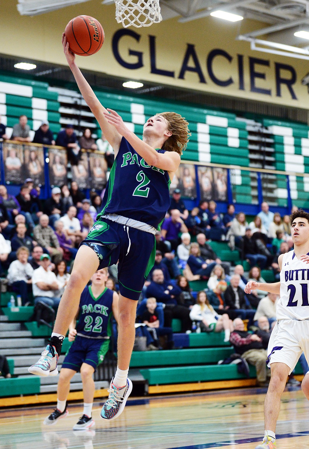 Glacier's Keifer Spohnhauer (2) lays in two points on a fast break against Butte at Glacier High School on Saturday. (Casey Kreider/Daily Inter Lake)