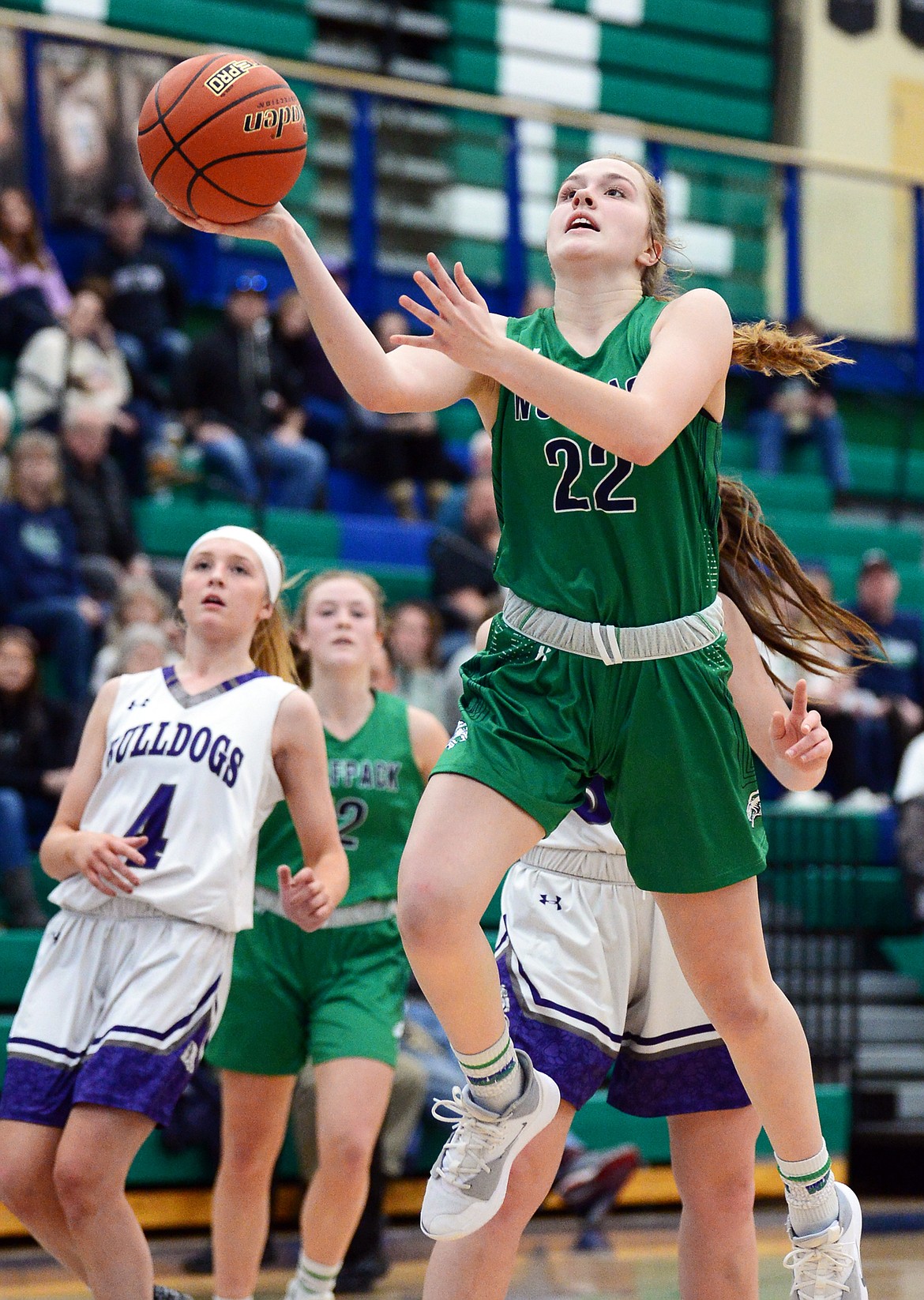 Glacier's Ellie Keller (22) drives to the hoop against Butte at Glacier High School on Saturday. (Casey Kreider/Daily Inter Lake)