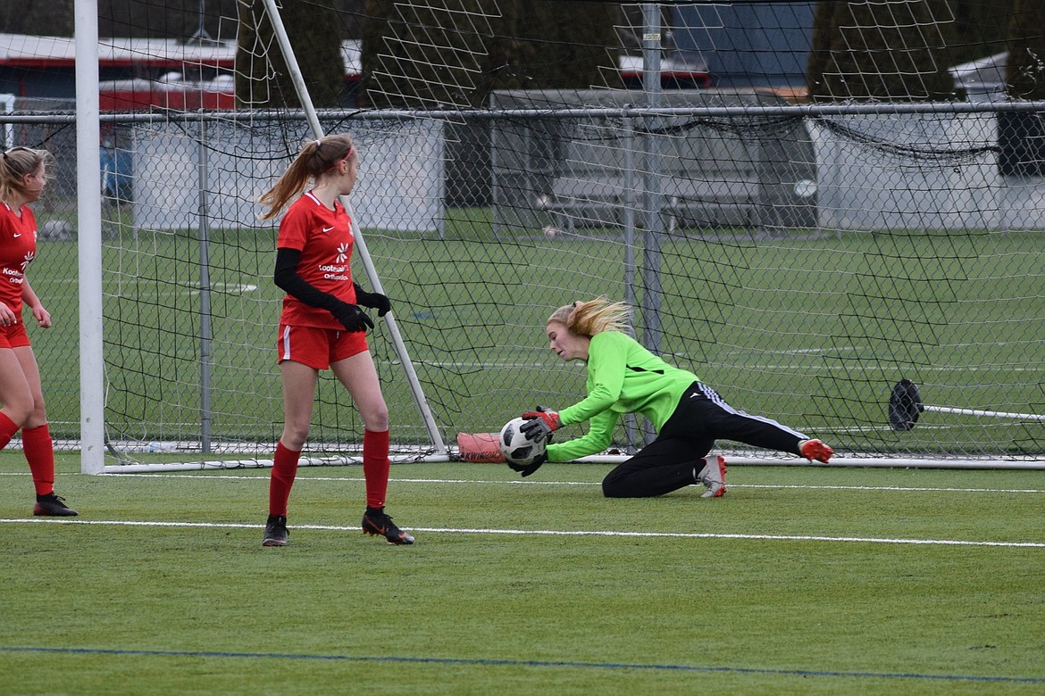 Photo by MARCEE HARTZELL
Thorns North FC 02/03 Girls Red soccer team goalkeeper Autumn Lambert makes a save as the Thorns beat Washington Premier FC G02 Black 3-2 during league play in Puyallup, Wash., on Sunday. Myah Rietze scored off a follow-up deflection from the post to get the Thorns on the board. Abbie Lyman scored the second goal from an assist by Reagan Hartzell. Madyson Smith scored the third goal unassisted after driving through multiple Washington Premier defenders.