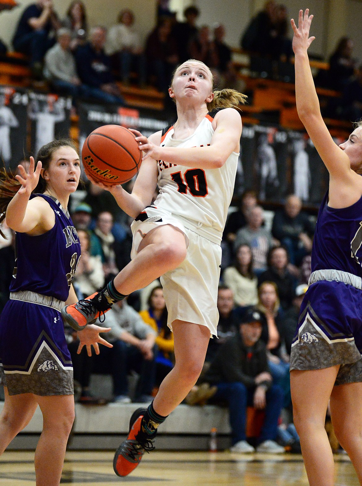 Flathead's Kennedy Kanter (10) drives to the basket against Butte at Flathead High School on Friday. (Casey Kreider/Daily Inter Lake)