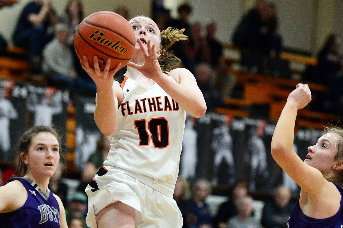 Flathead's Kennedy Kanter (10) drives to the basket against Butte at Flathead High School on Friday. (Casey Kreider/Daily Inter Lake)