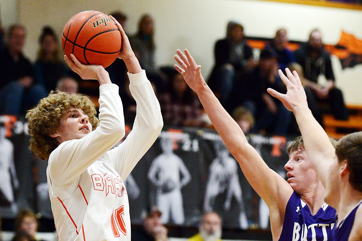 Flathead's Hunter Hickey (10) looks to shoot against Butte at Flathead High School on Friday. (Casey Kreider/Daily Inter Lake)