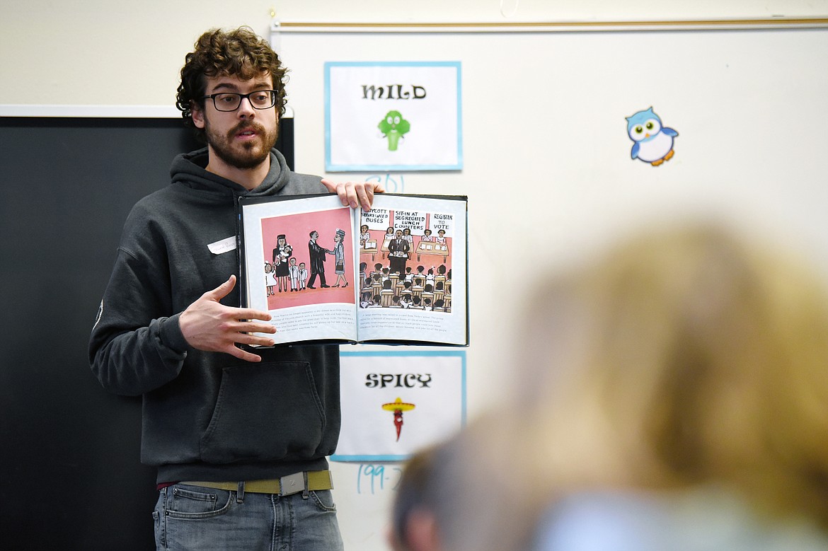 Denali Shaw with AmeriCorps VISTA, reads &#147;My Dream of Martin Luther King&#148; by Faith Ringgold to Trista Arentz&#146;s third-grade class at East Evergreen Elementary on Thursday, Jan. 16. (Casey Kreider photos/Daily Inter Lake)