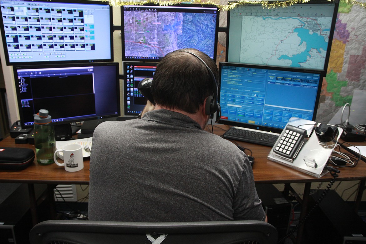 Dispatchers routinely work long hours &#151; up to 12 &#151; during shifts of three or four days per week as they handle calls and dispatch fire, police and medical services for Kootenai County, Coeur d'Alene police and several other law enforcment and emergency agencies in North Idaho. (RALPH BARTHOLDT)