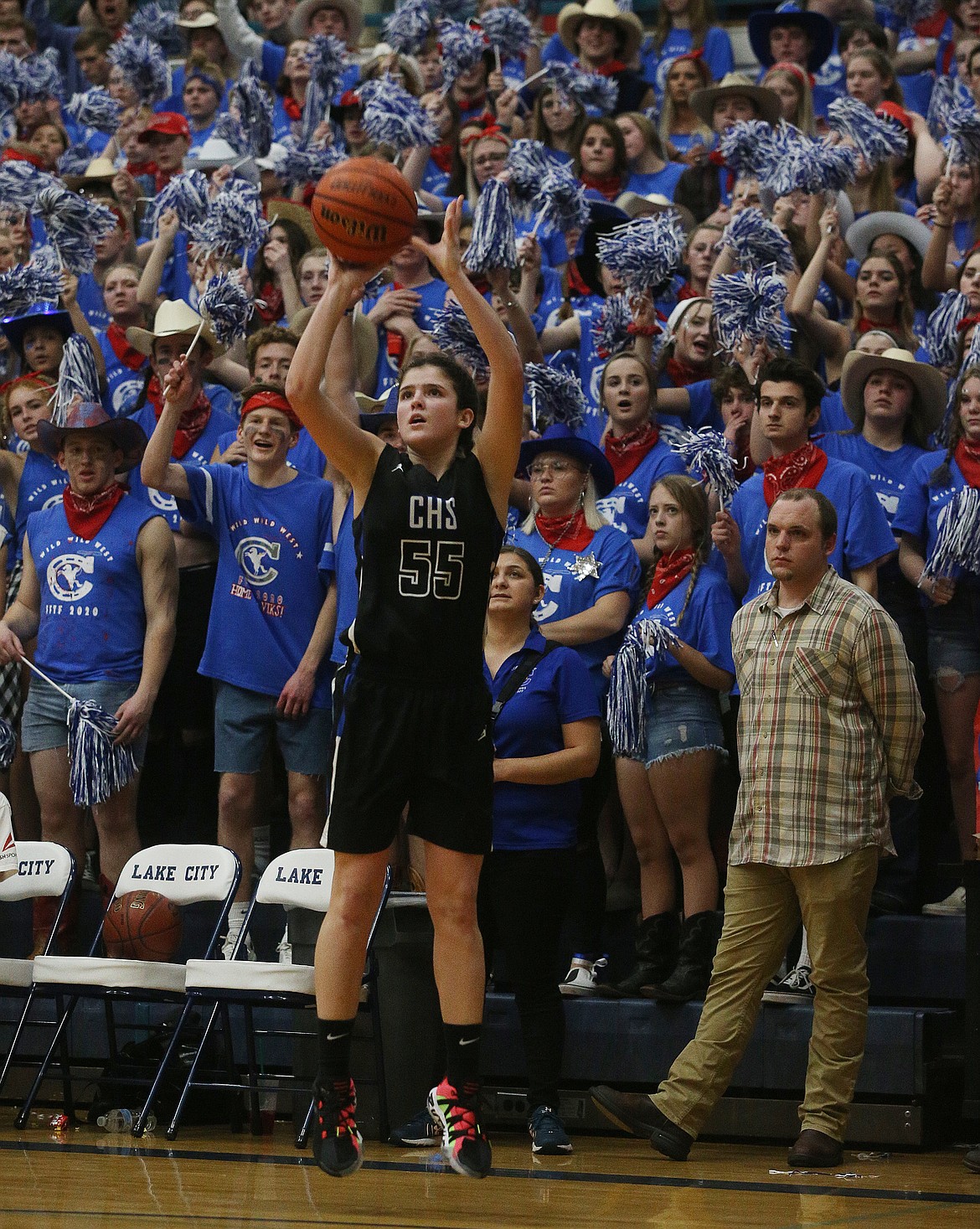 Coeur dAlenes Skylar Burke shoots a three pointer against Lake City in the girls Fight for the Fish rivalry game Friday at Lake City High. (LOREN BENOIT/Press)