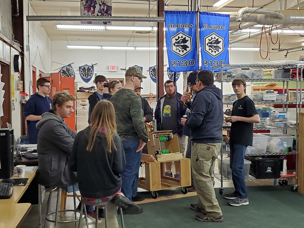 The students and mentors discuss this year&#146;s build and competition strategies.