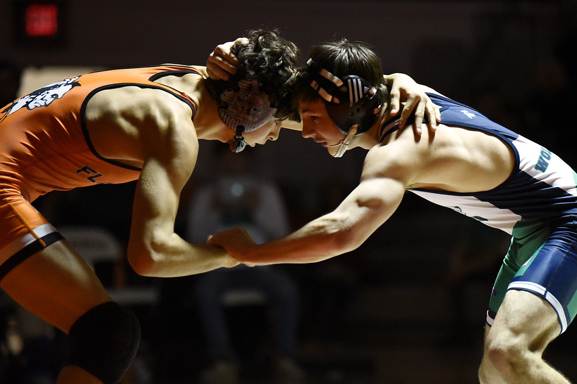 Flathead's Asher Kemppainen wrestles Glacier's Lance Fretwell at 132 lbs. at Flathead High School on Friday. Kemppainen won by decision. (Casey Kreider/Daily Inter Lake)