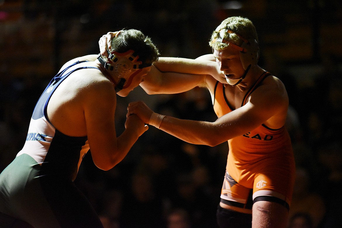 Flathead's Zaybin Stewart wrestles Glacier's Caedon Seymour at 205 lbs. at Flathead High School on Friday. Stewart won by pin. (Casey Kreider/Daily Inter Lake)