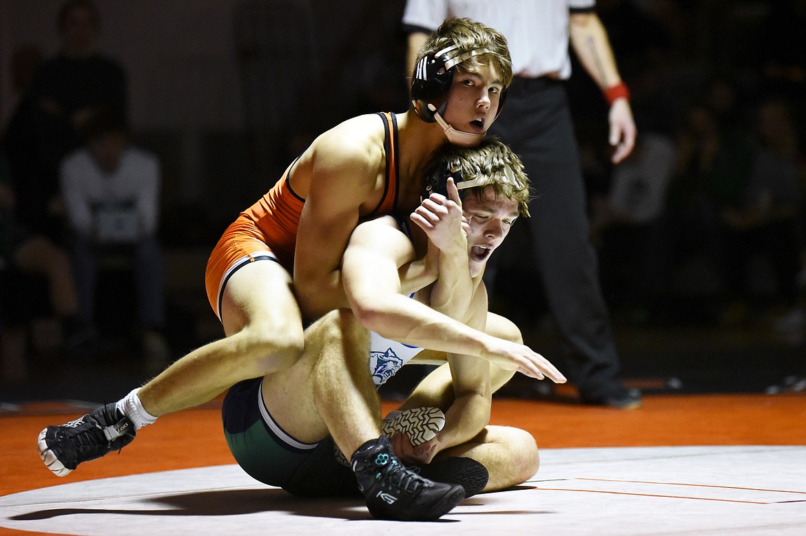 Flathead's Chase Youso wrestles Glacier's Caden Gilmond at 160 lbs. at Flathead High School on Friday. Youso won by decision. (Casey Kreider/Daily Inter Lake)