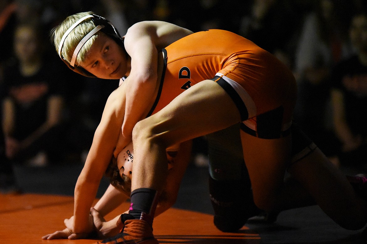 Glacier's Josh Melton wrestles Flathead's Dylan Kratofil at 103 lbs. at Flathead High School on Friday. Melton won by pin. (Casey Kreider/Daily Inter Lake)