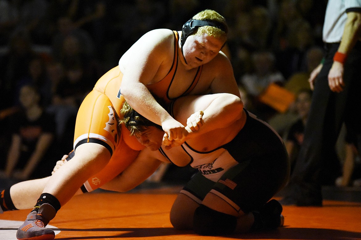 Flathead's Ayden Prieto wrestles Glacier's Camryn Vergeront at heavyweight at Flathead High School on Friday. Vergeront won by pin. (Casey Kreider/Daily Inter Lake)