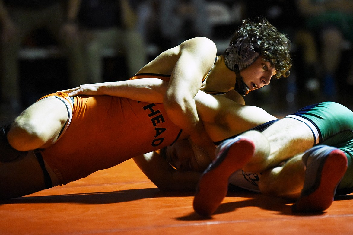 Flathead's Asher Kemppainen wrestles Glacier's Lance Fretwell at 132 lbs. at Flathead High School on Friday. Kemppainen won by decision. (Casey Kreider/Daily Inter Lake)