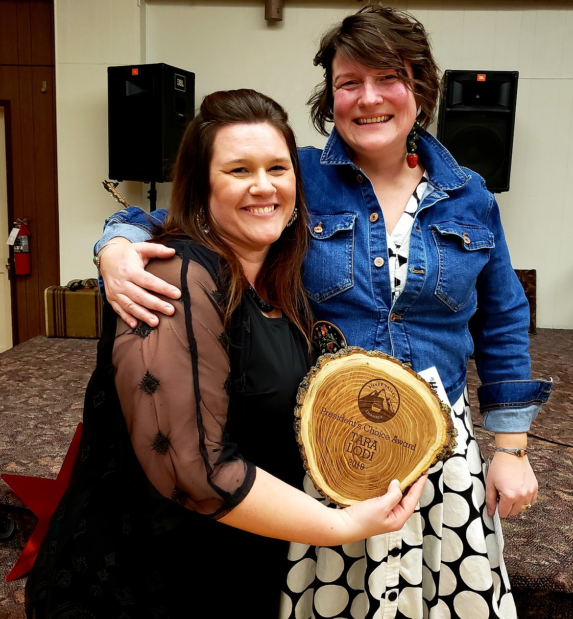 SVCC Past President Sarah Murphy (right) presents a second Silver Valley Chamber President&#146;s Choice Award to Tara Lodi.