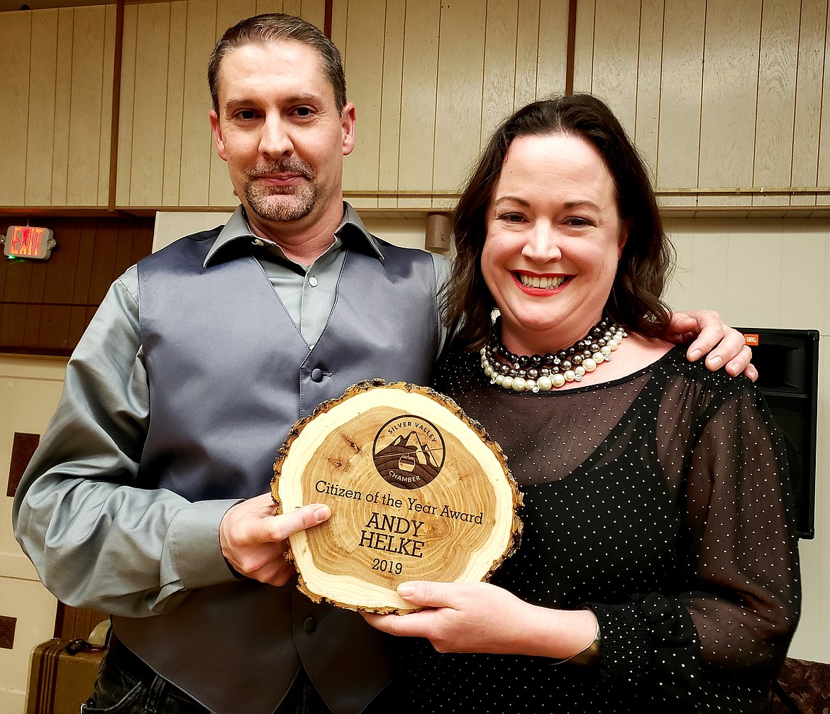 SVCC 1st VP Diannah Fields-Brown (right) presents the Silver Valley Chamber Citizen of the Year award to Andy Helke.